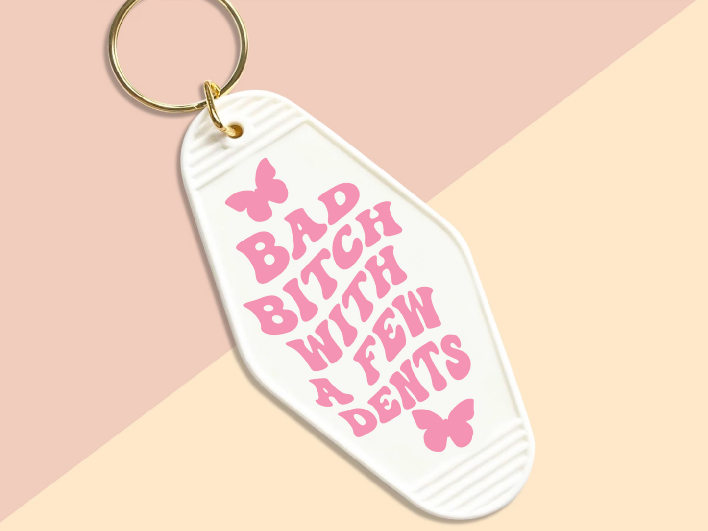 Bad bitch with a few dents - Motel keychain