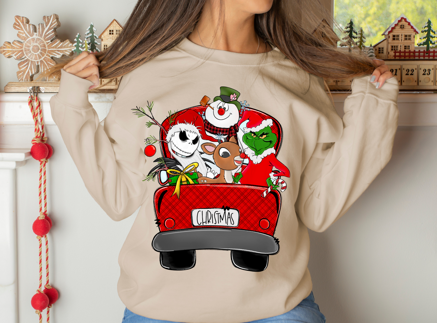 Christmas characters riding in red truck