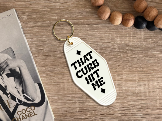 That curb hit me - Motel keychain