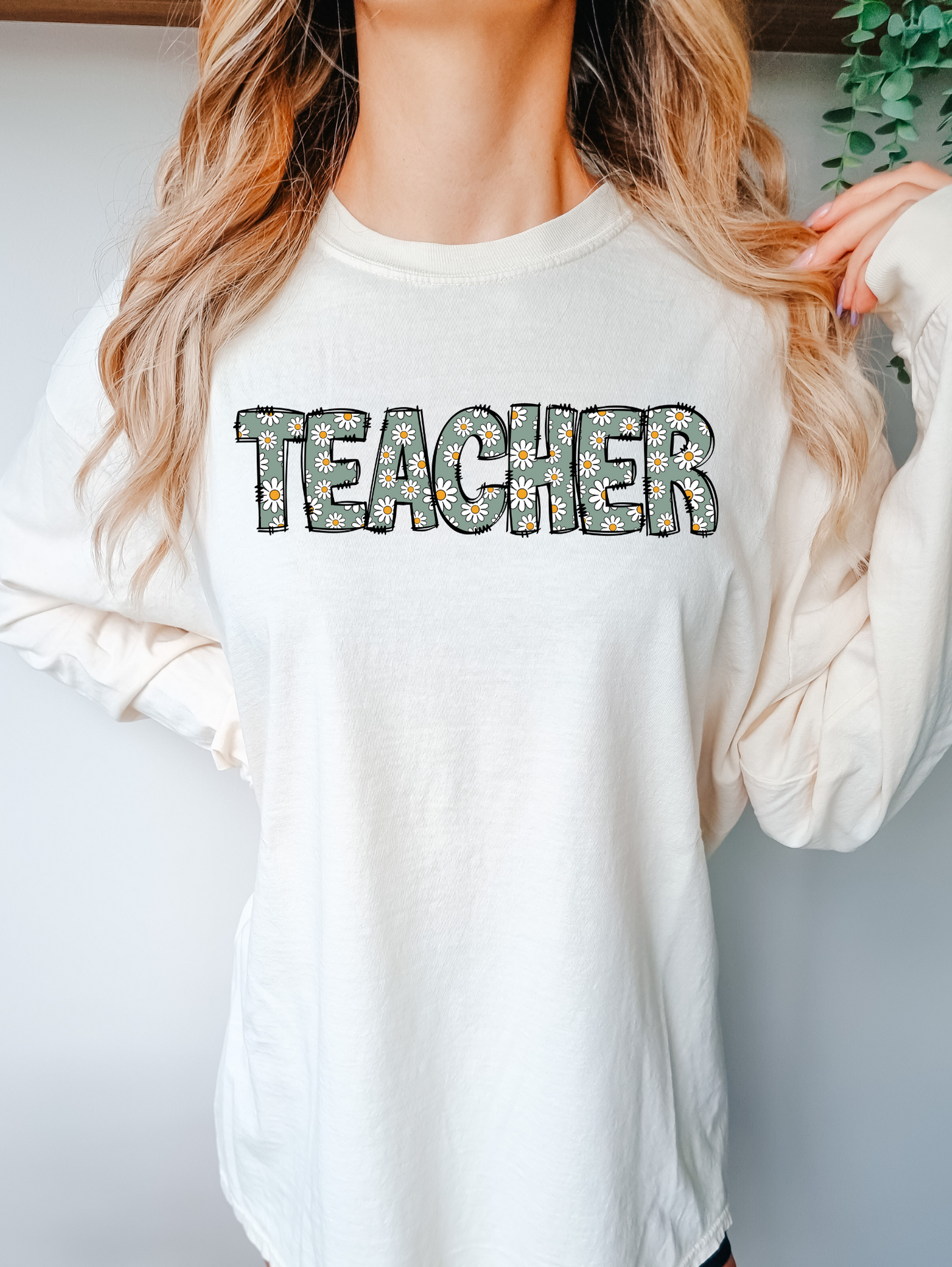 Teacher- daisies within letters