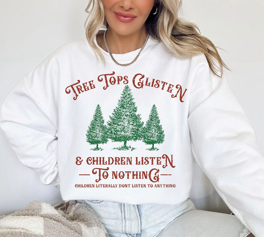 Tree tops glisten and children listen to nothing