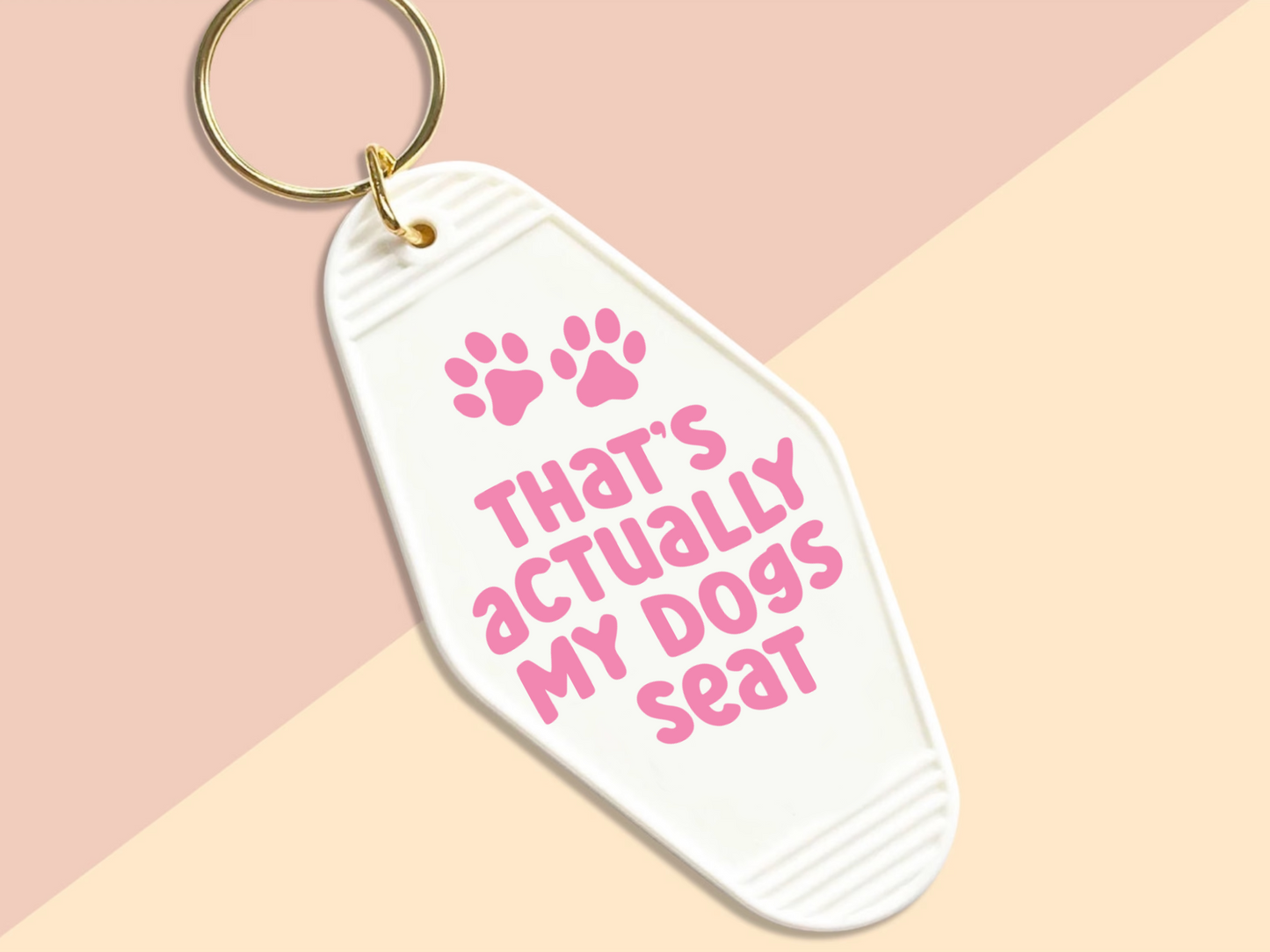 That's actually my dog's seat - Motel keychain