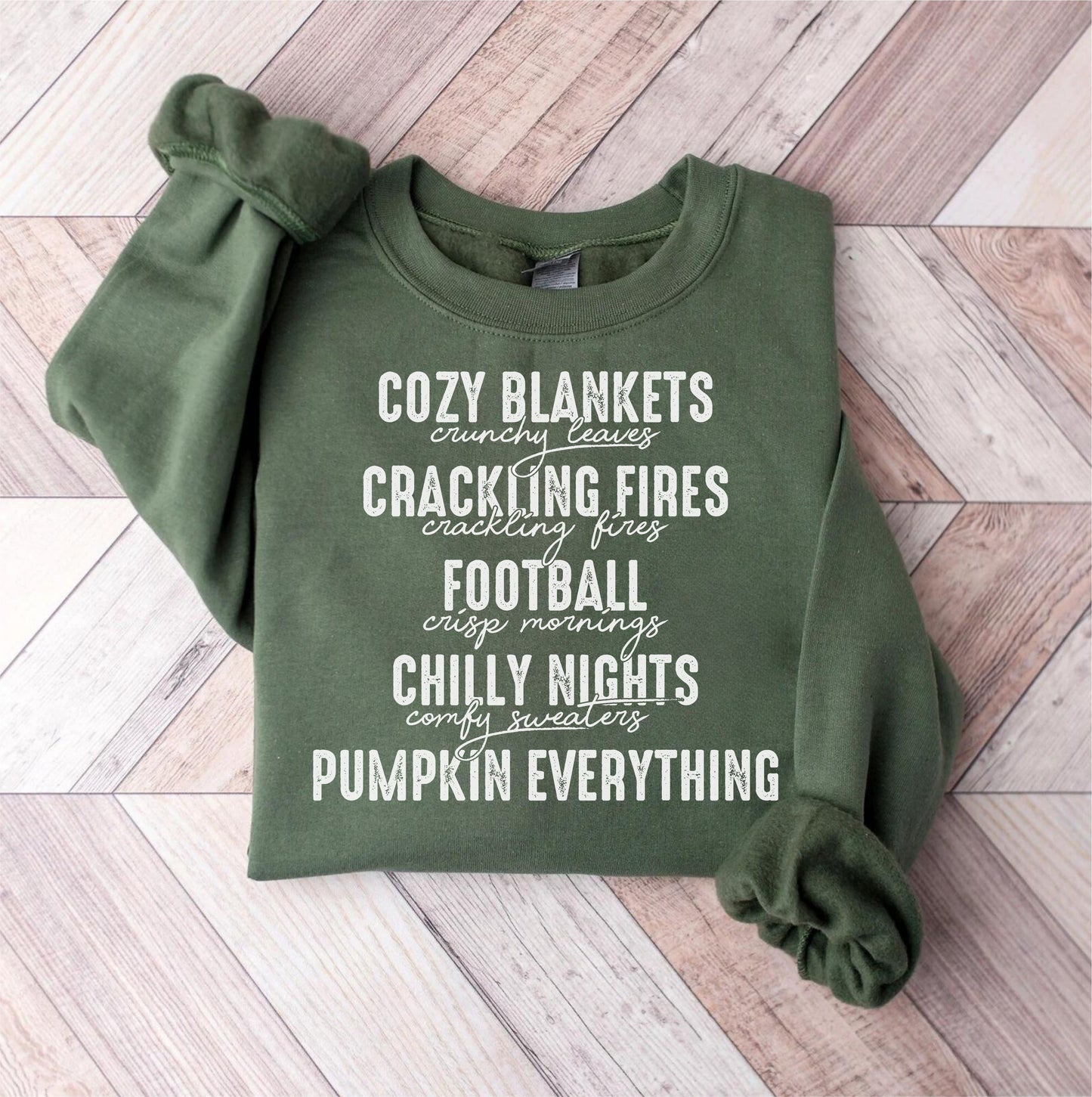 Cozy blankets, crackling fires, football - white letters